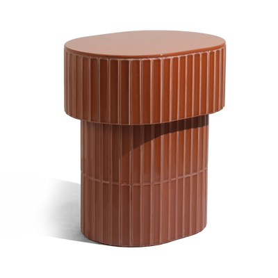 A modern oval side table or stool with a grooved ceramic tiled finish featuring a round top and a warm brown color, shown on a plain background.